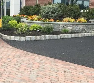 Asphalt & Masonry Stone and asphalt driveway