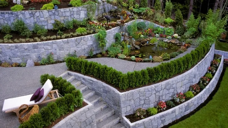 luxury sloped backyard retaining wall